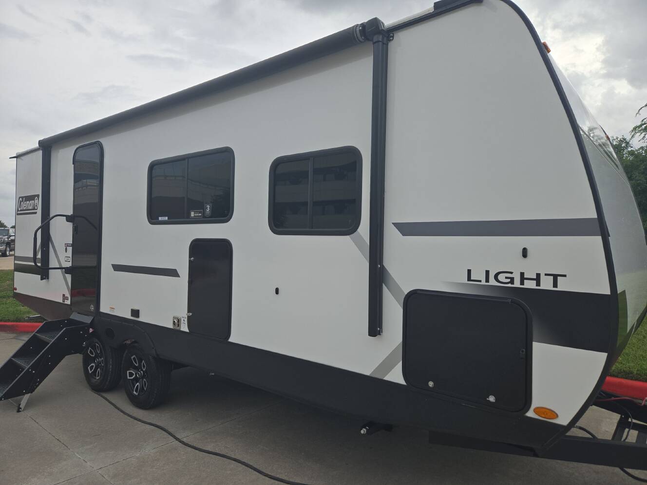 A photo of this 2027 Keystone COLEMAN LIGHT 22BX