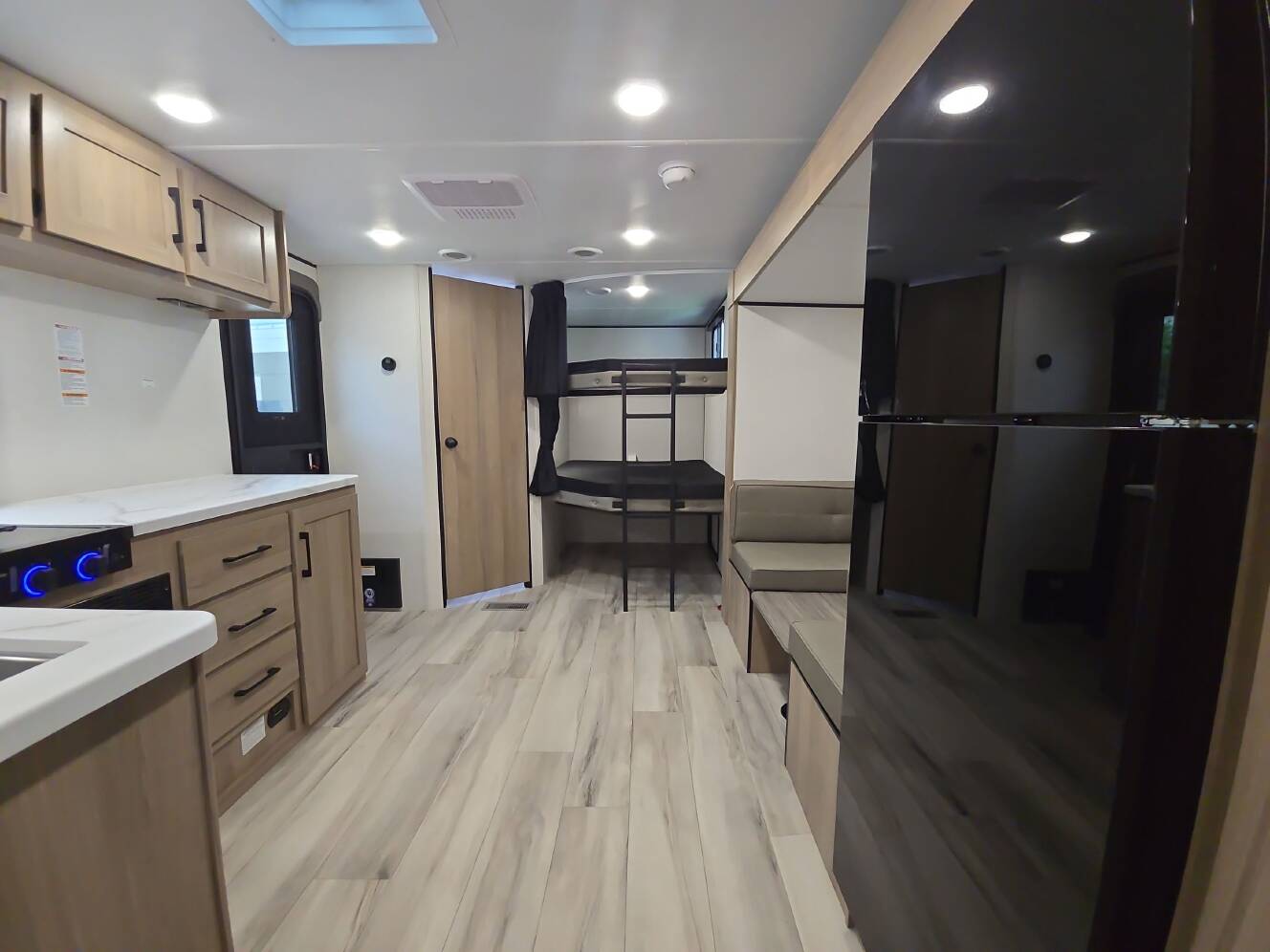 A photo of this 2027 Keystone COLEMAN LIGHT 22BX