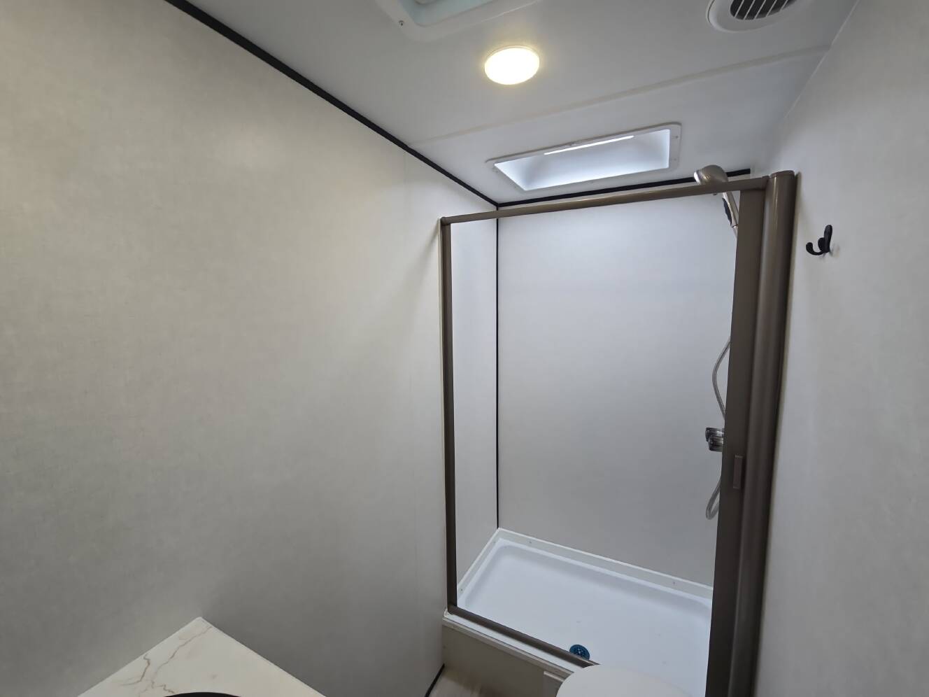 A photo of this 2027 Keystone COLEMAN LIGHT 22BX