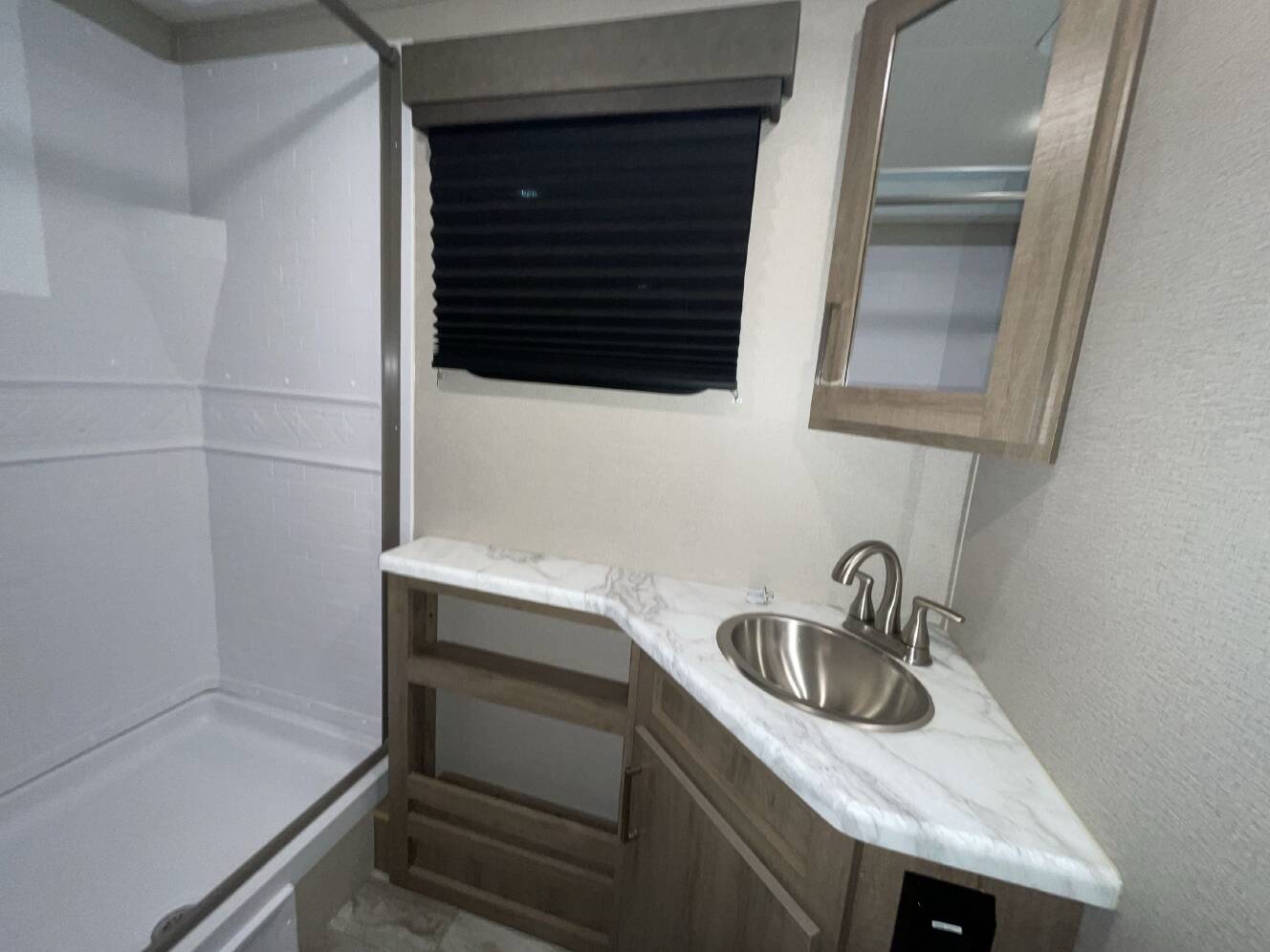 A photo of this 2022 Grand Design IMAGINE XLS 21BHE