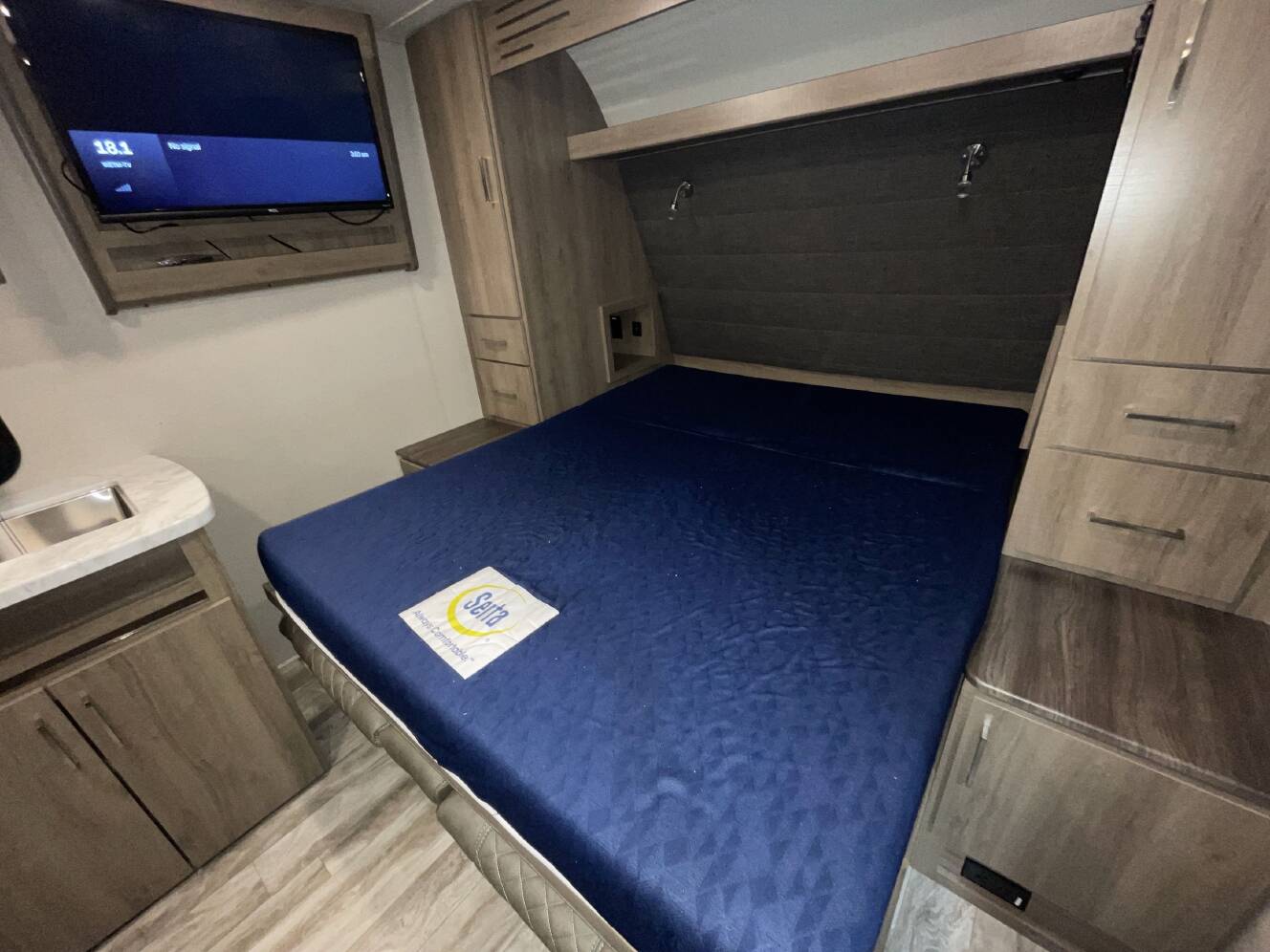 A photo of this 2022 Grand Design IMAGINE XLS 21BHE