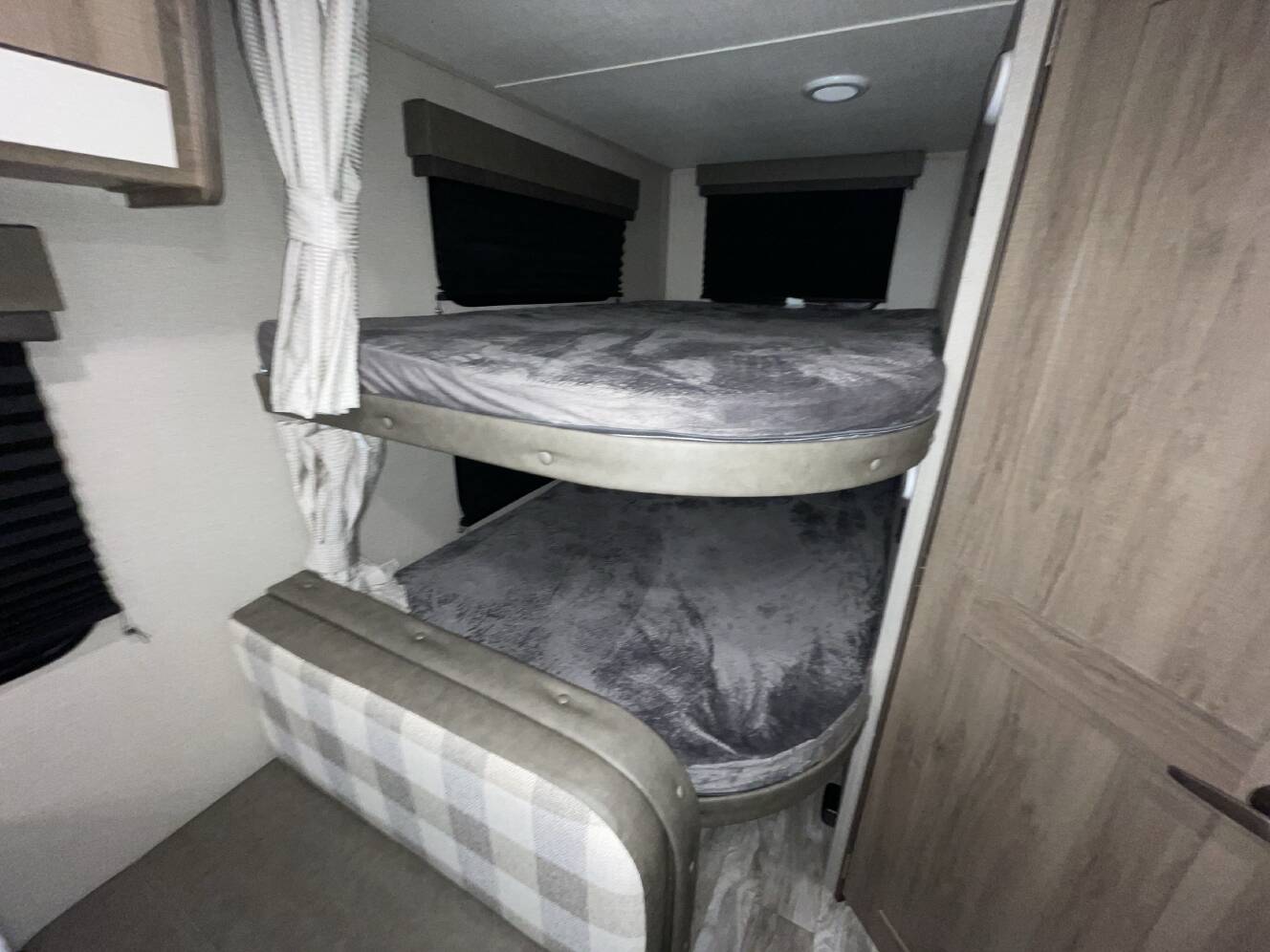 A photo of this 2022 Grand Design IMAGINE XLS 21BHE