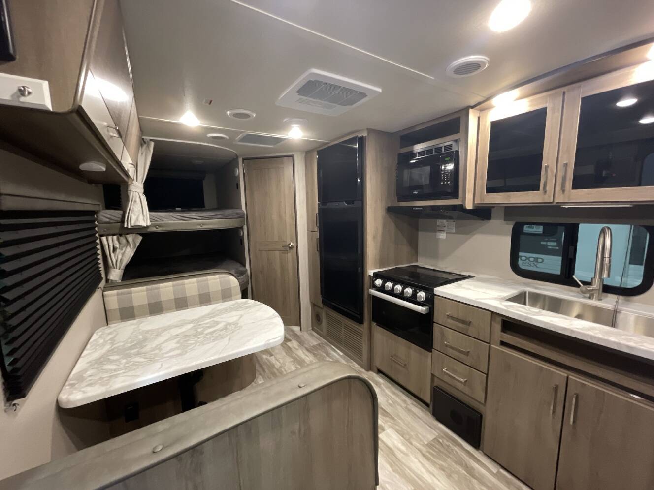 A photo of this 2022 Grand Design IMAGINE XLS 21BHE