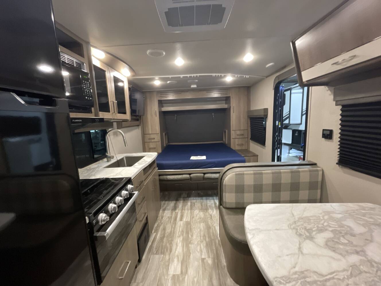A photo of this 2022 Grand Design IMAGINE XLS 21BHE