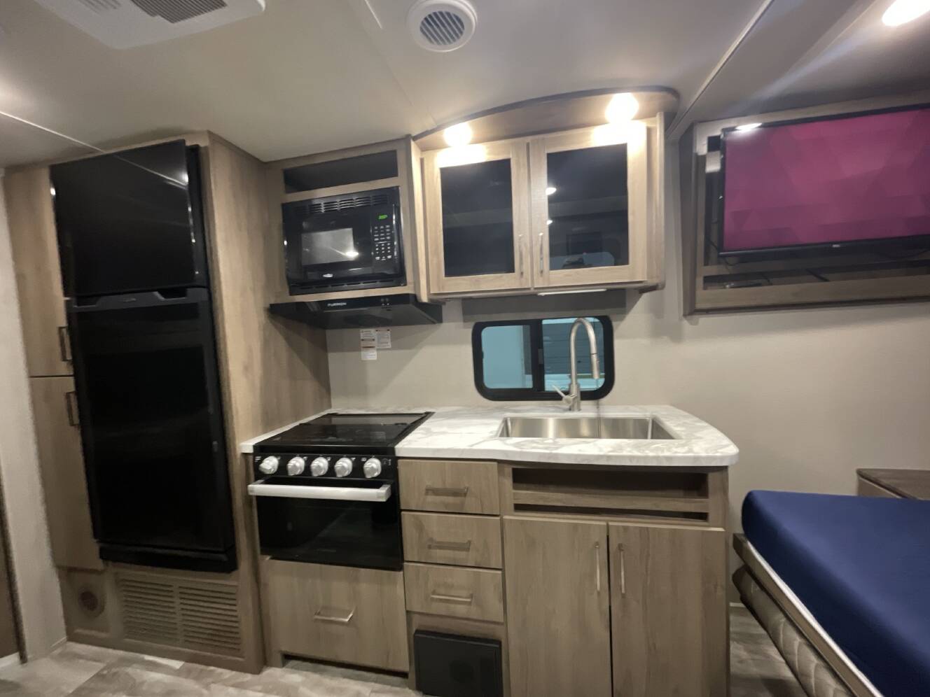 A photo of this 2022 Grand Design IMAGINE XLS 21BHE