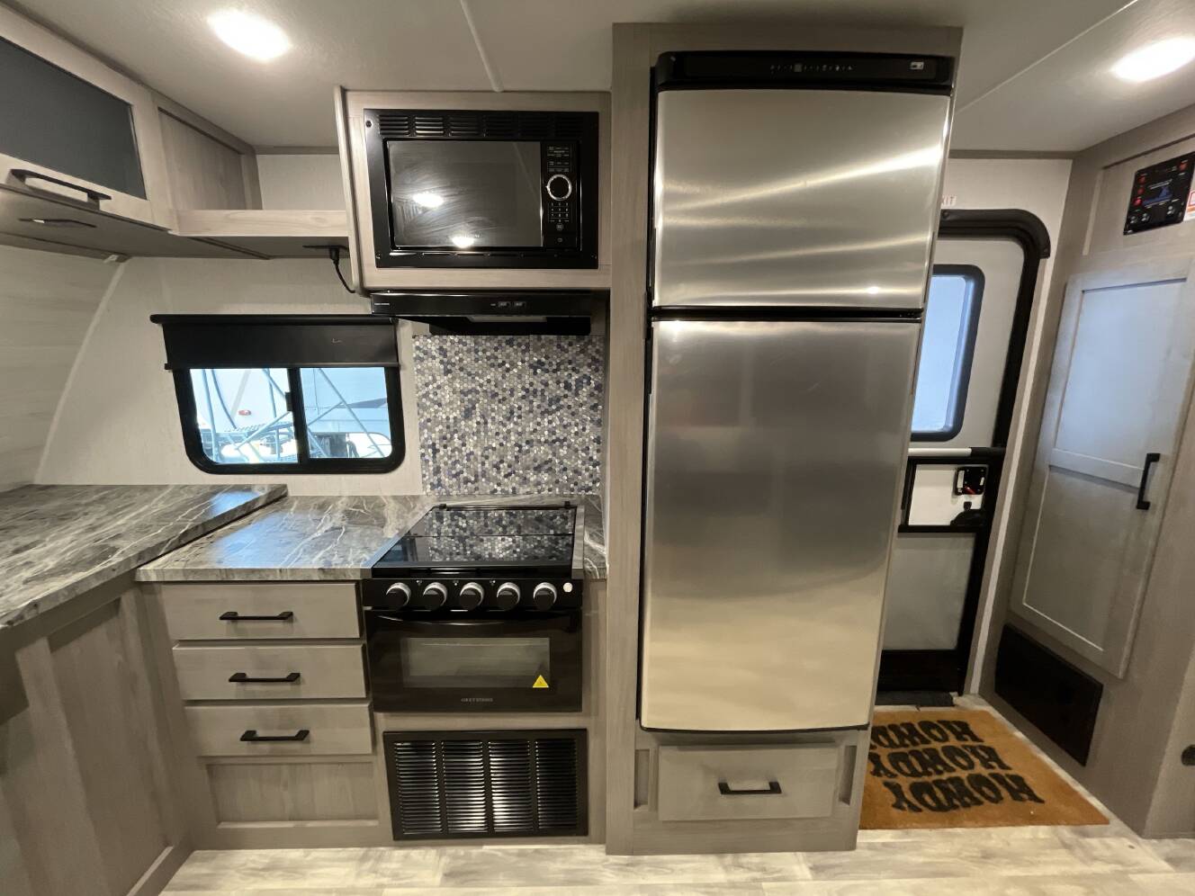 A photo of this 2022 Dutchmen KODIAK ULTIMATE 2921FKDS