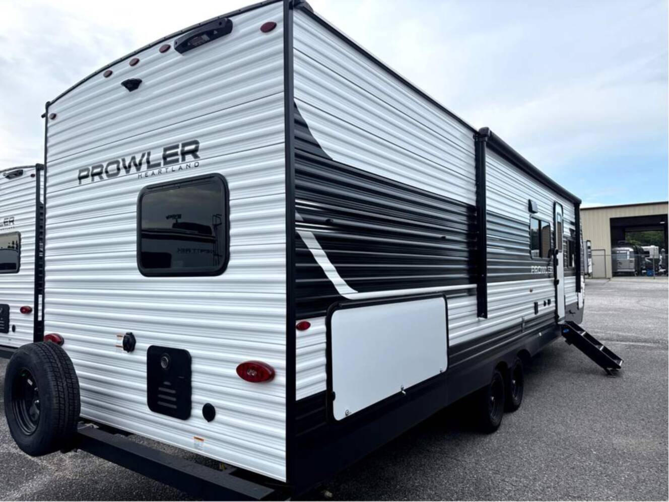 A photo of this 2027 Heartland Prowler 2802BHS