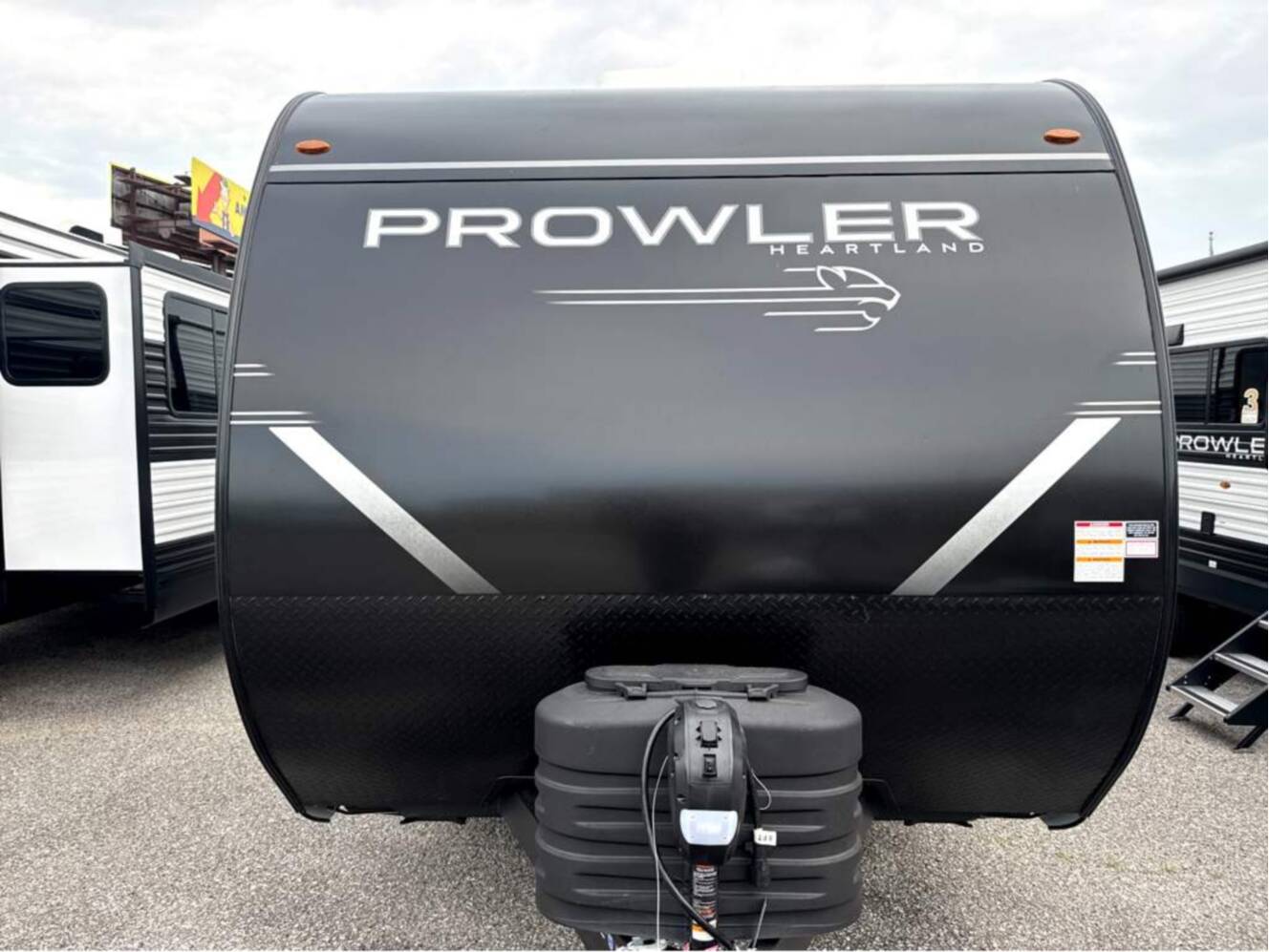 A photo of this 2027 Heartland Prowler 2802BHS