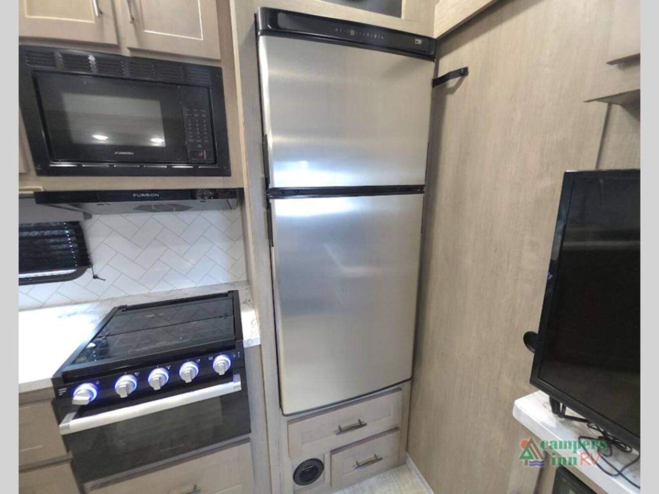 A photo of this 2023 Grand Design Momentum 31G
