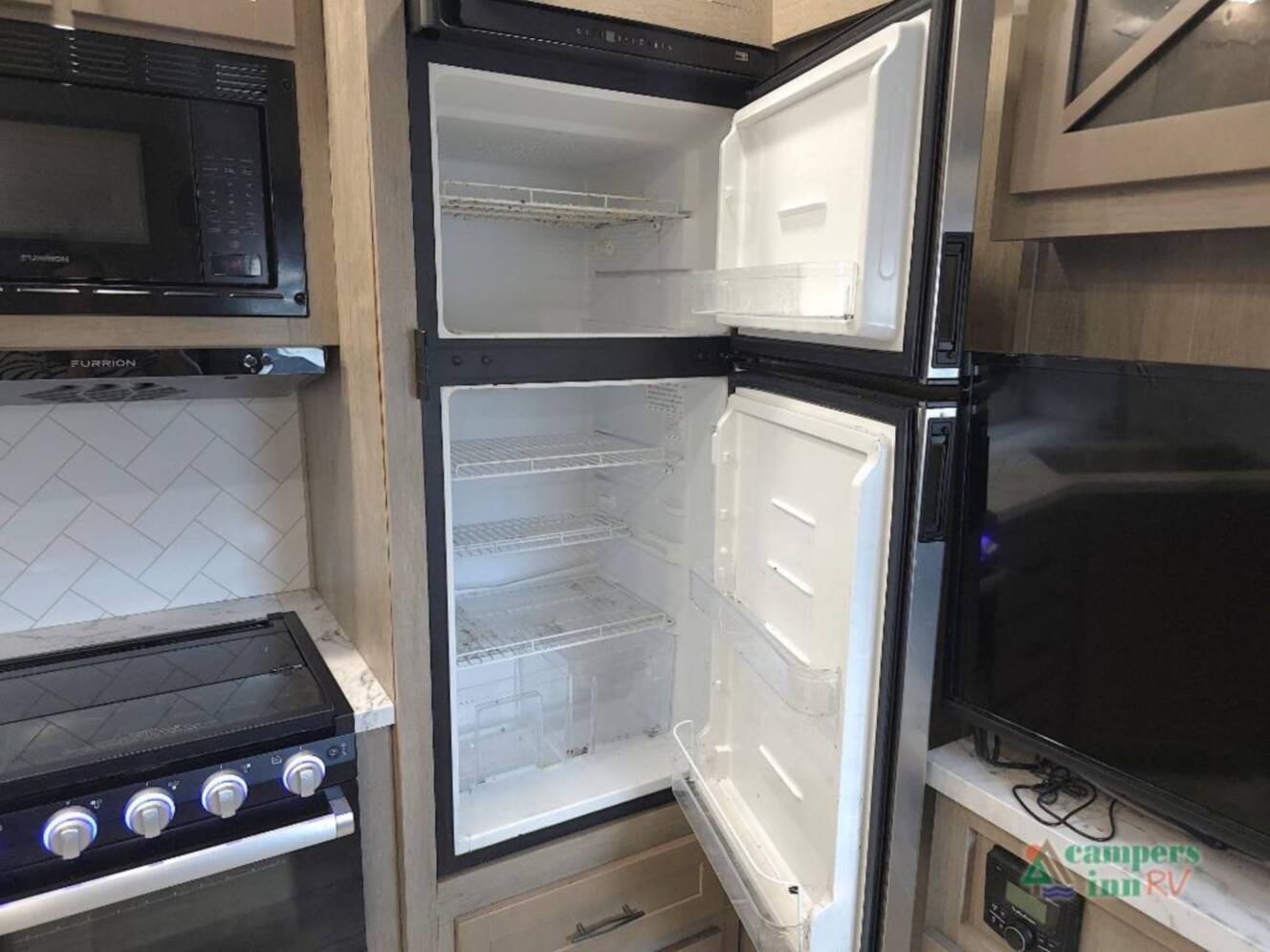 A photo of this 2023 Grand Design Momentum 31G