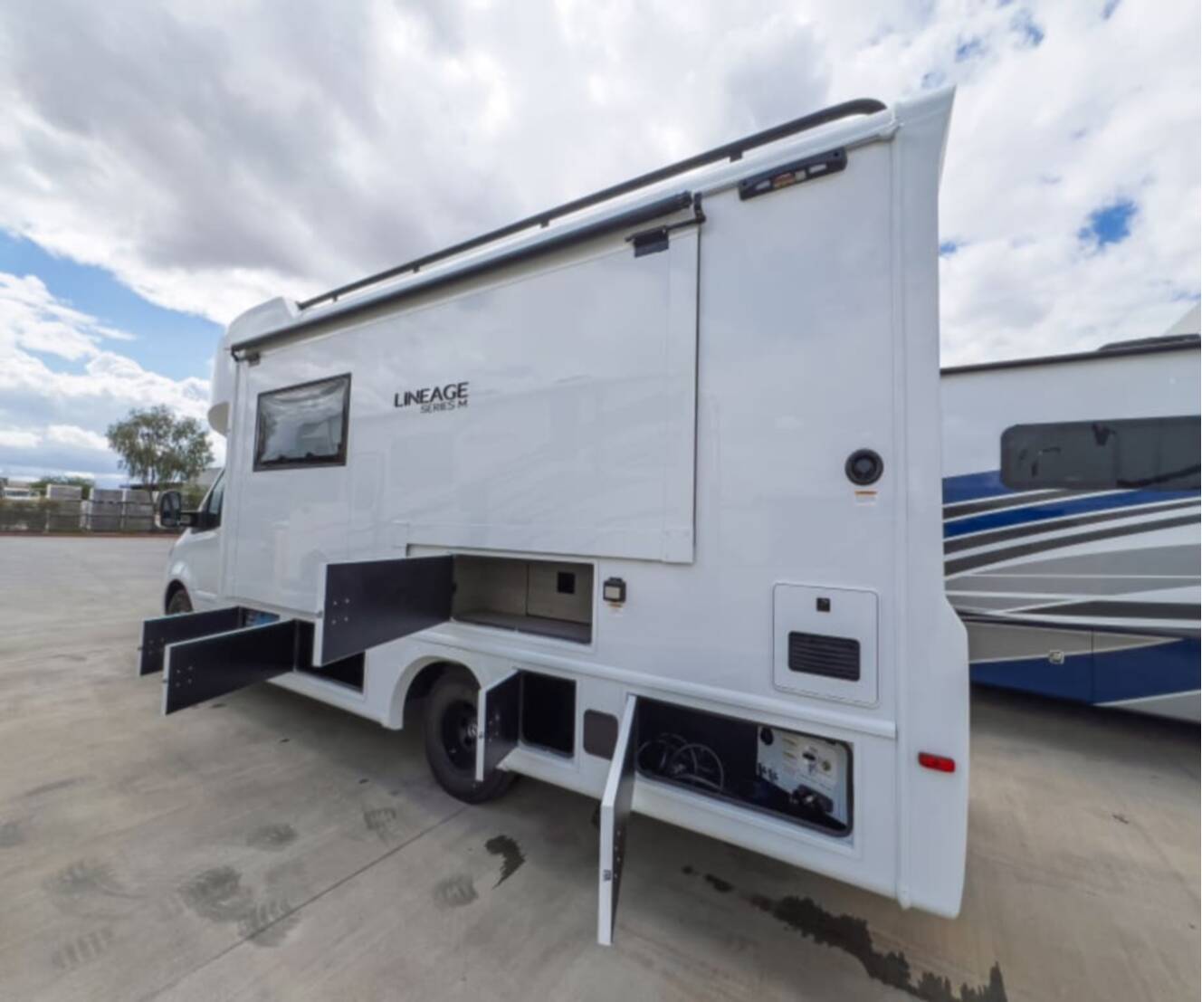 A photo of this 2026 Grand Design LINEAGE SERIES M 25FW-FBP
