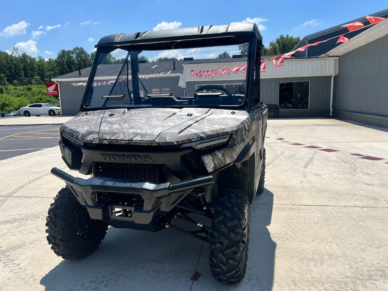 A photo of this 2026 Honda Pioneer 1000 Deluxe