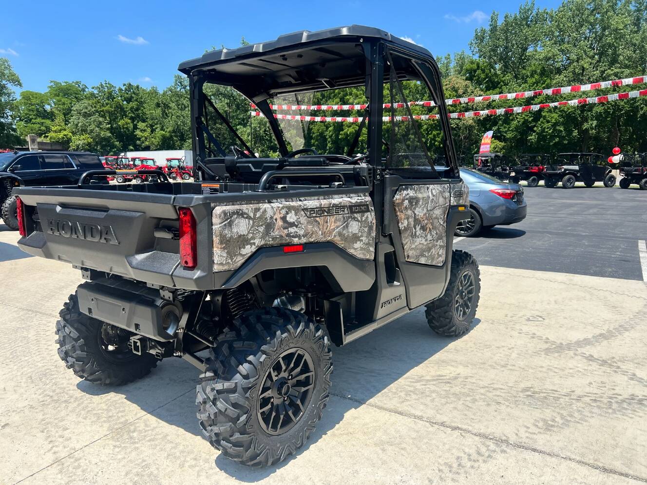 A photo of this 2026 Honda Pioneer 1000 Deluxe