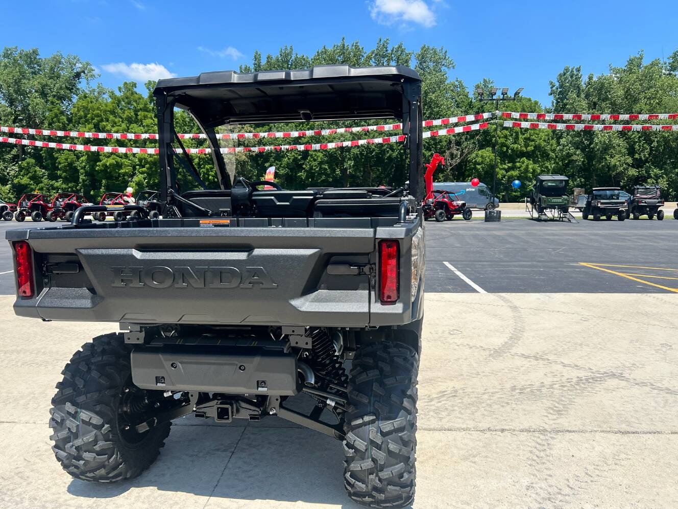 A photo of this 2026 Honda Pioneer 1000 Deluxe