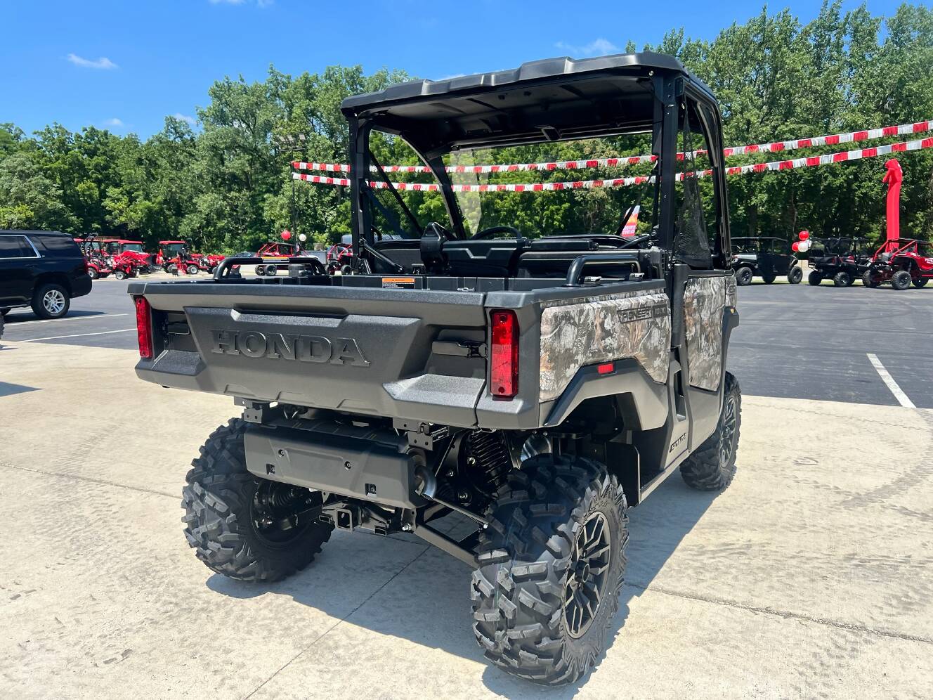 A photo of this 2026 Honda Pioneer 1000 Deluxe