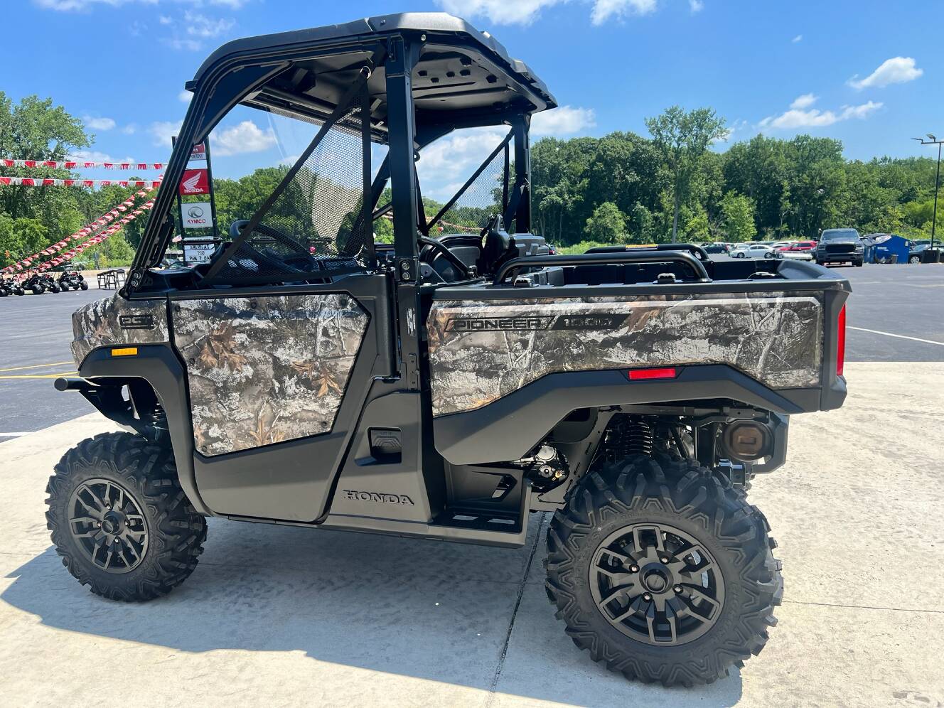 A photo of this 2026 Honda Pioneer 1000 Deluxe