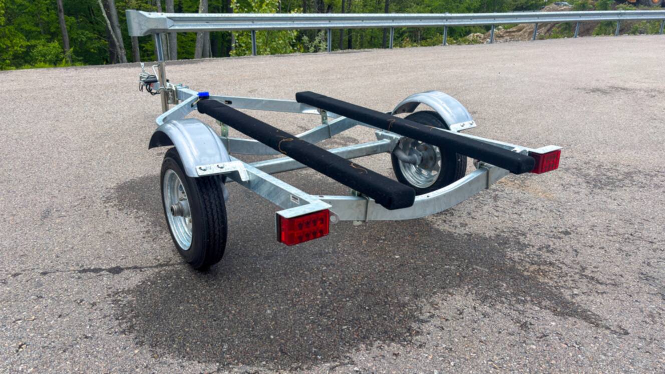 A photo of this 2026 Karavan Trailers Single Watercraft Low Profile Steel- WCE-1250-46-L
