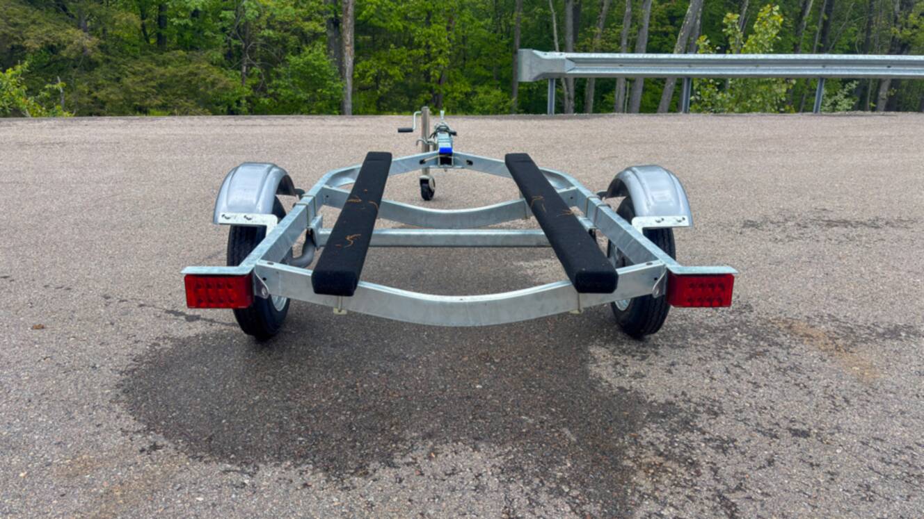 A photo of this 2026 Karavan Trailers Single Watercraft Low Profile Steel- WCE-1250-46-L