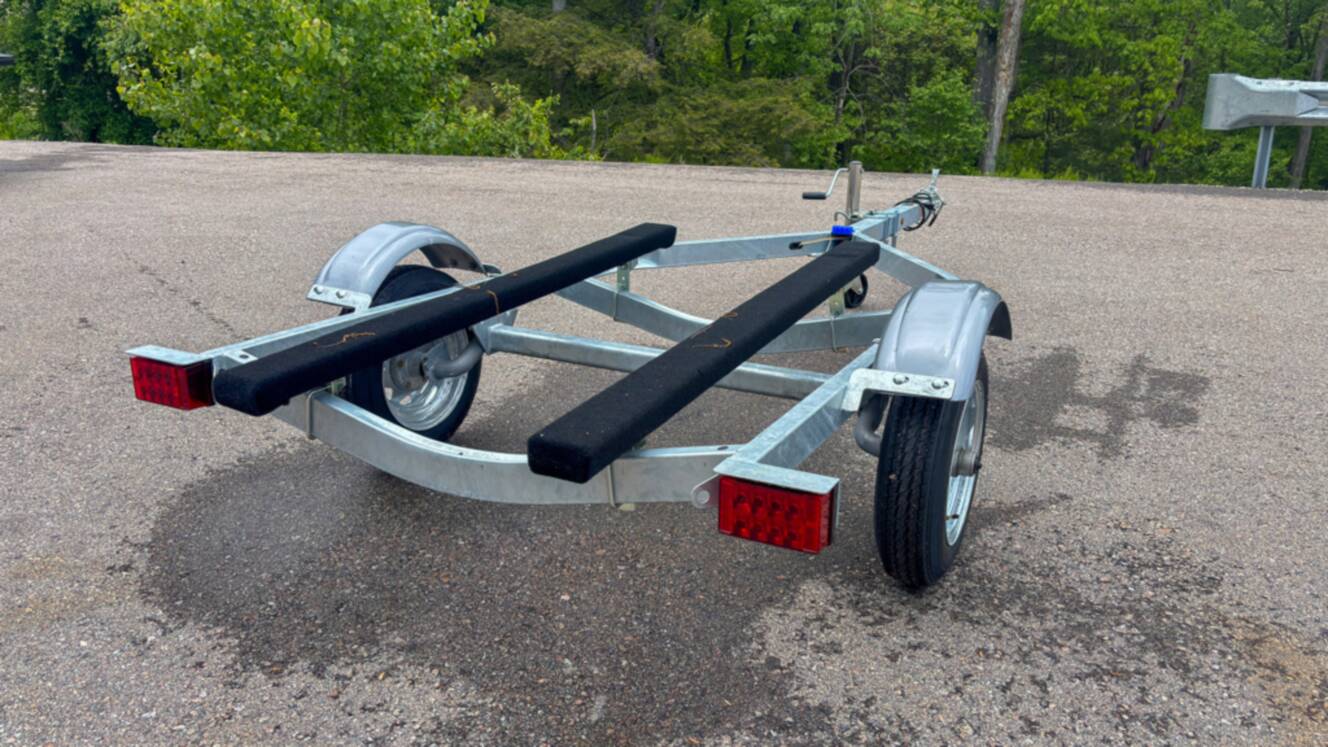 A photo of this 2026 Karavan Trailers Single Watercraft Low Profile Steel- WCE-1250-46-L