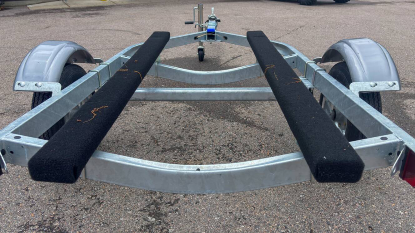 A photo of this 2026 Karavan Trailers Single Watercraft Low Profile Steel- WCE-1250-46-L