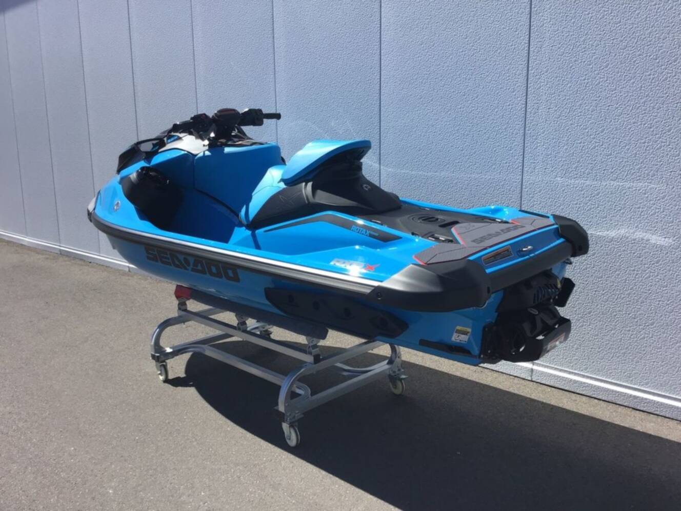 A photo of this 2026 Sea-Doo RXP-X 325 Tech, BRP Premium A, iBR Gulfstream Blue P