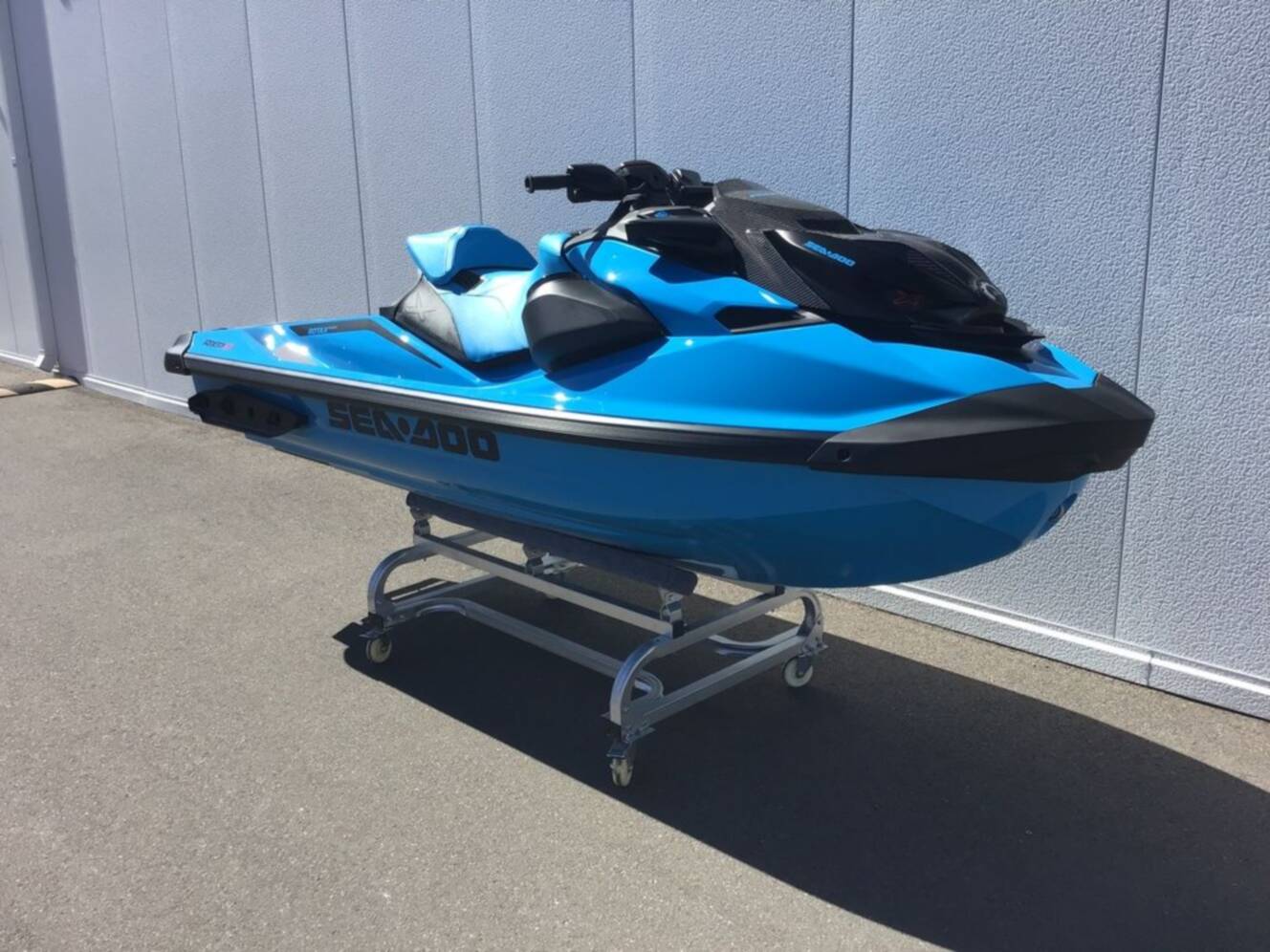 A photo of this 2026 Sea-Doo RXP-X 325 Tech, BRP Premium A, iBR Gulfstream Blue P