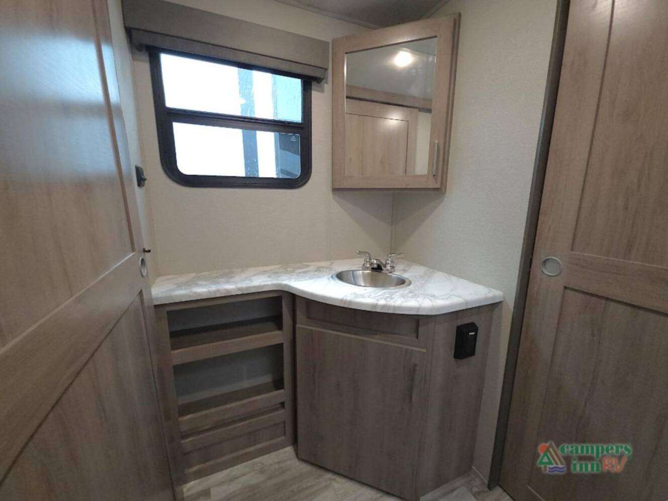 A photo of this 2022 Grand Design Imagine XLS 23LDE