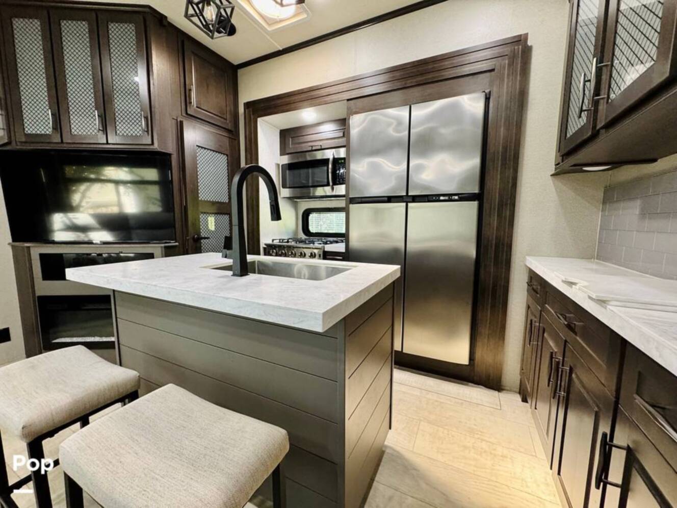 A photo of this 2022 Grand Design Momentum M-Class 351MS