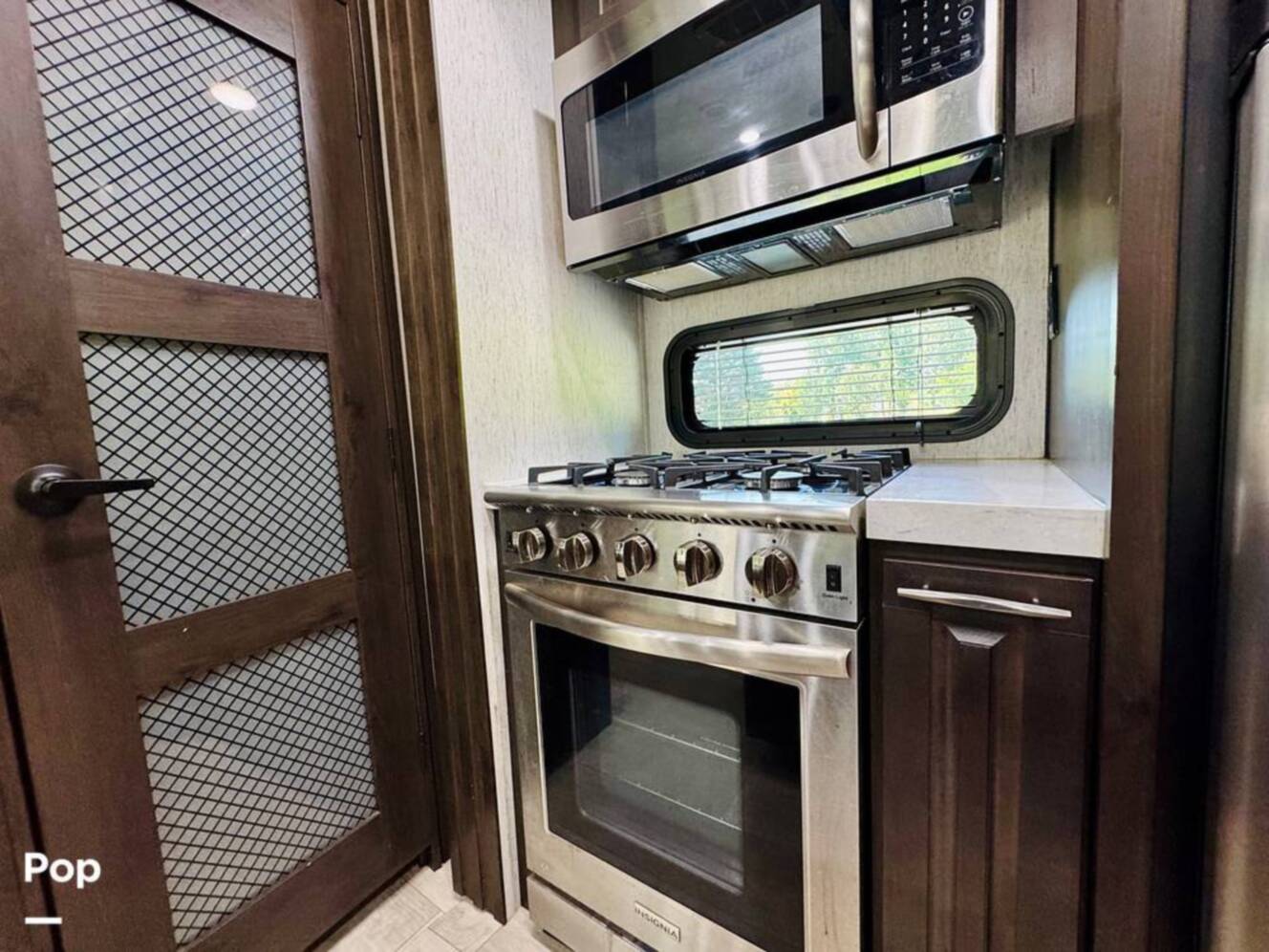 A photo of this 2022 Grand Design Momentum M-Class 351MS