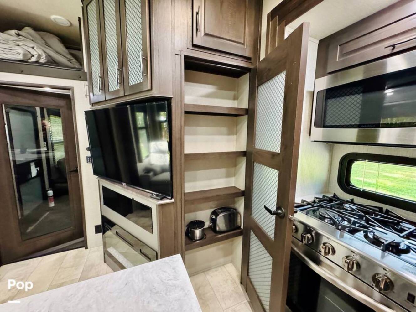A photo of this 2022 Grand Design Momentum M-Class 351MS