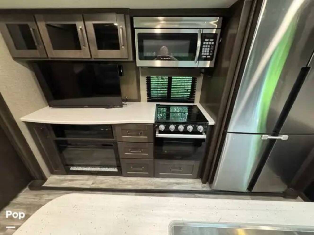 A photo of this 2021 Grand Design Reflection 312BHTS