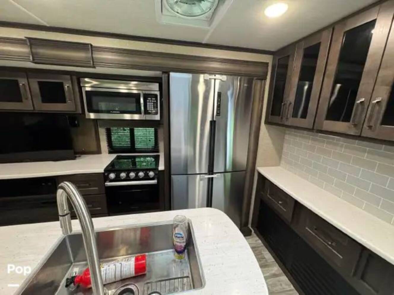 A photo of this 2021 Grand Design Reflection 312BHTS