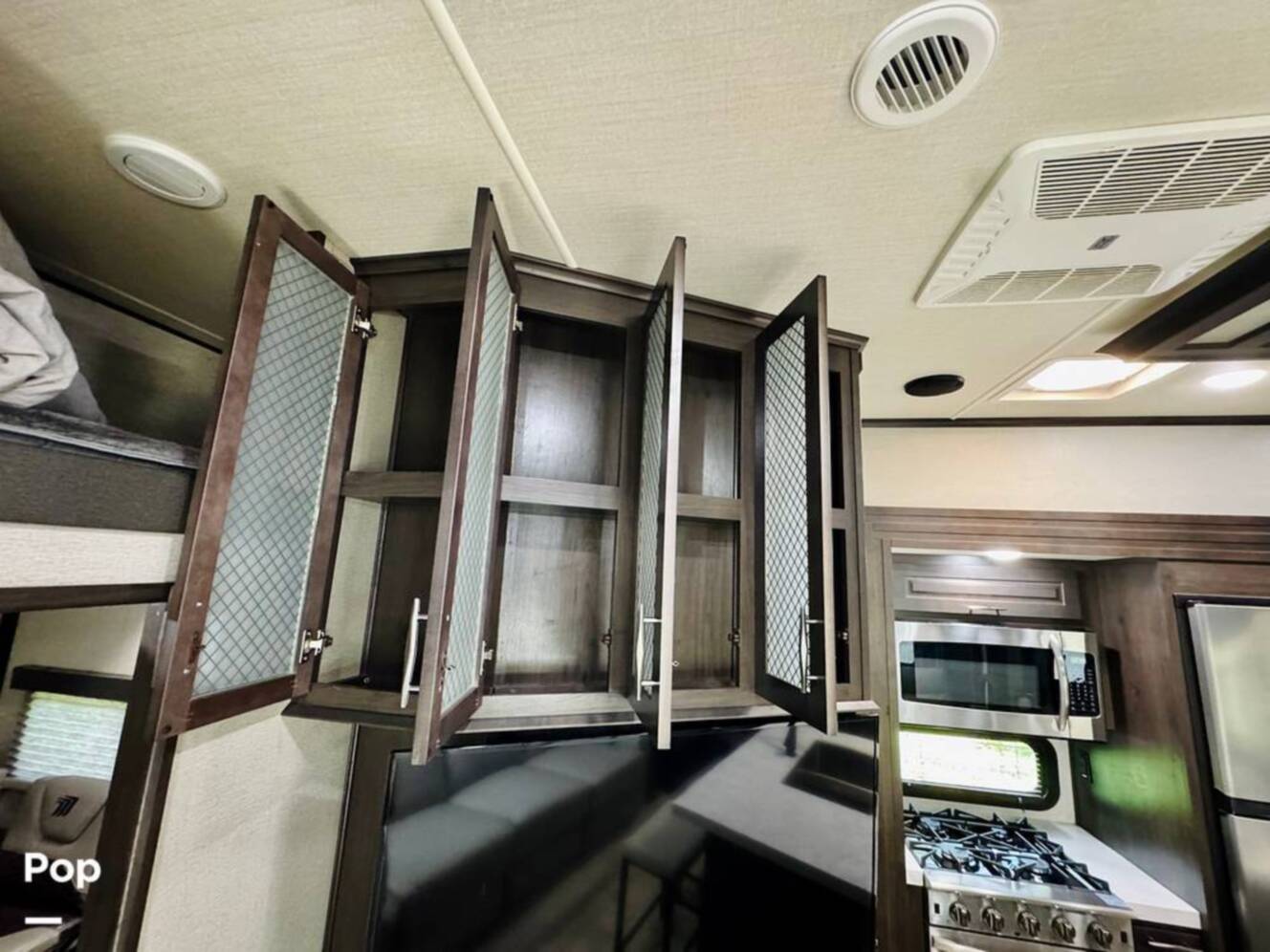 A photo of this 2022 Grand Design Momentum M-Class 351MS