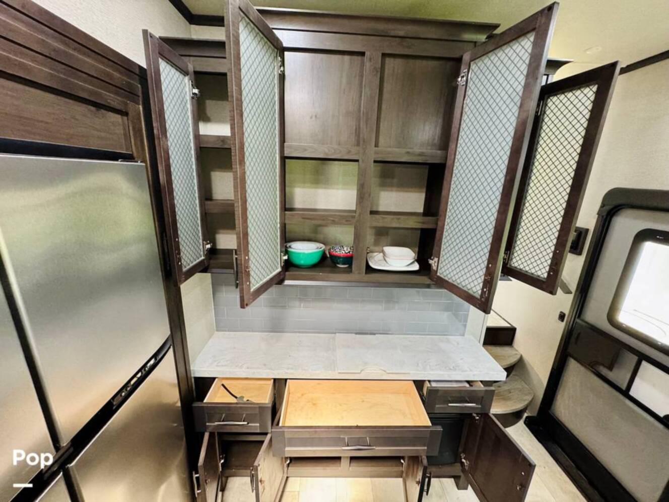 A photo of this 2022 Grand Design Momentum M-Class 351MS