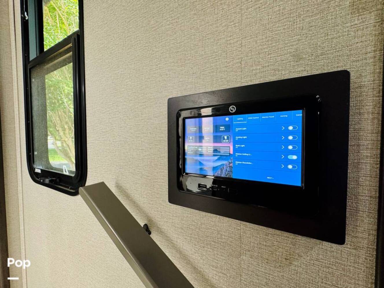A photo of this 2022 Grand Design Momentum M-Class 351MS
