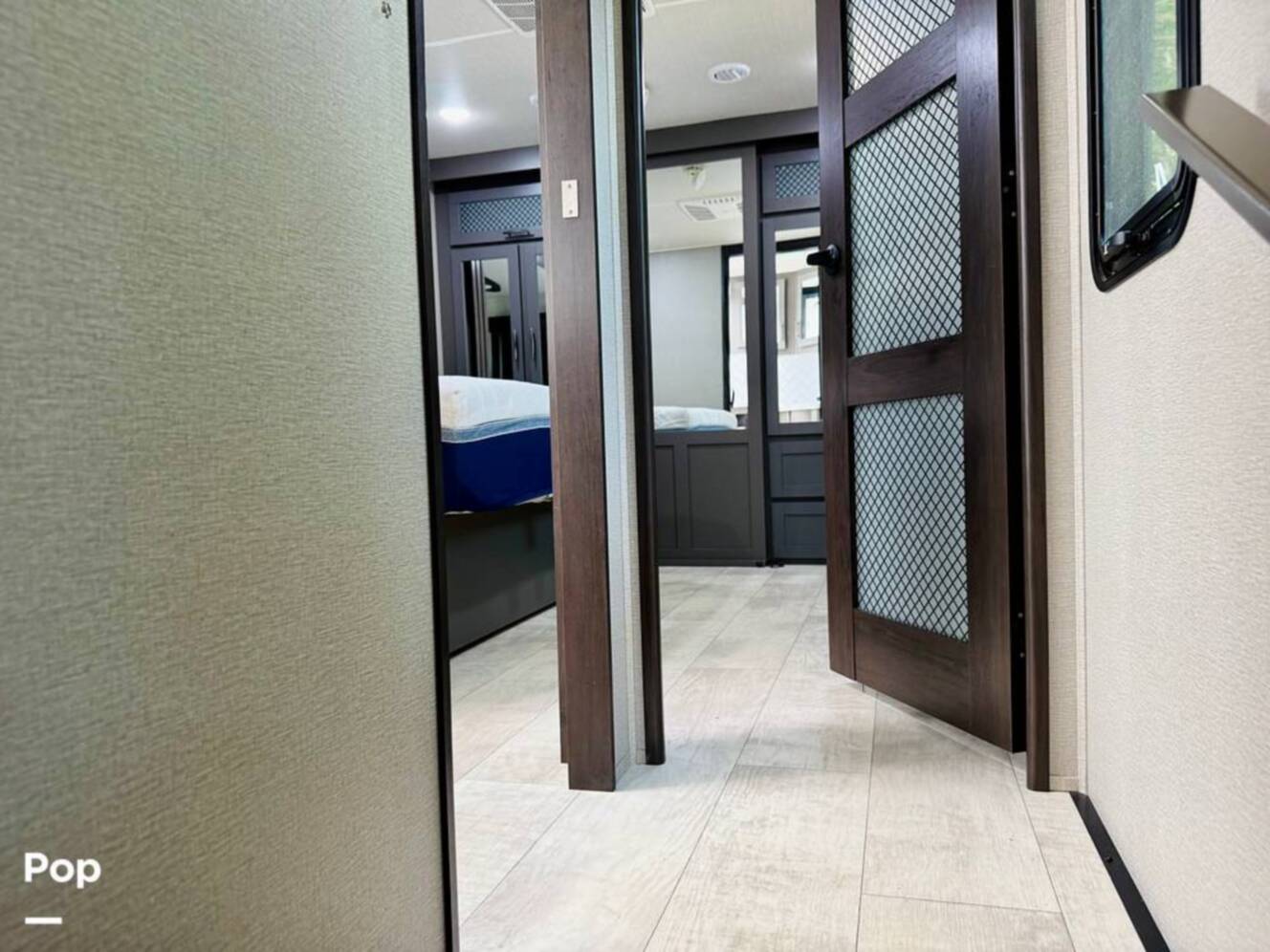 A photo of this 2022 Grand Design Momentum M-Class 351MS