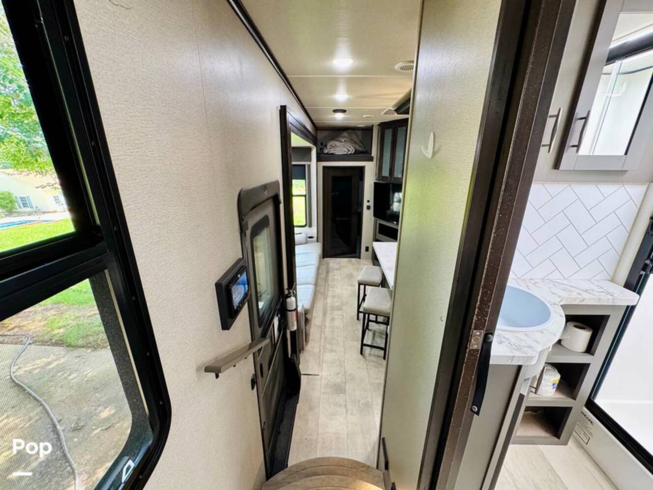 A photo of this 2022 Grand Design Momentum M-Class 351MS