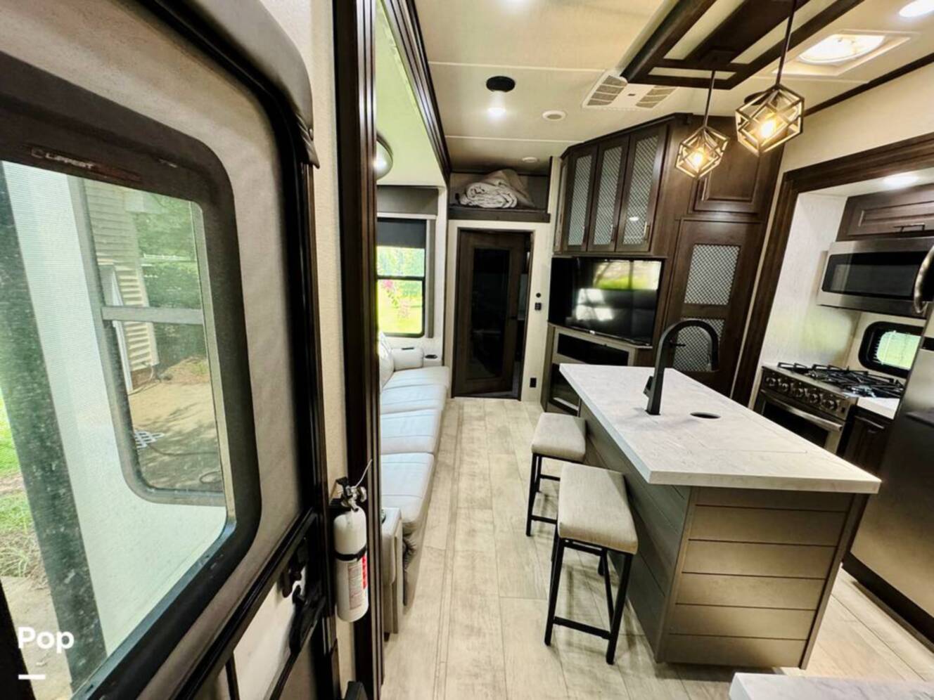 A photo of this 2022 Grand Design Momentum M-Class 351MS