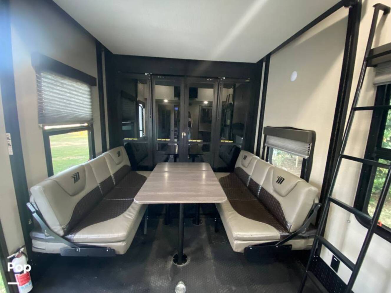A photo of this 2022 Grand Design Momentum M-Class 351MS