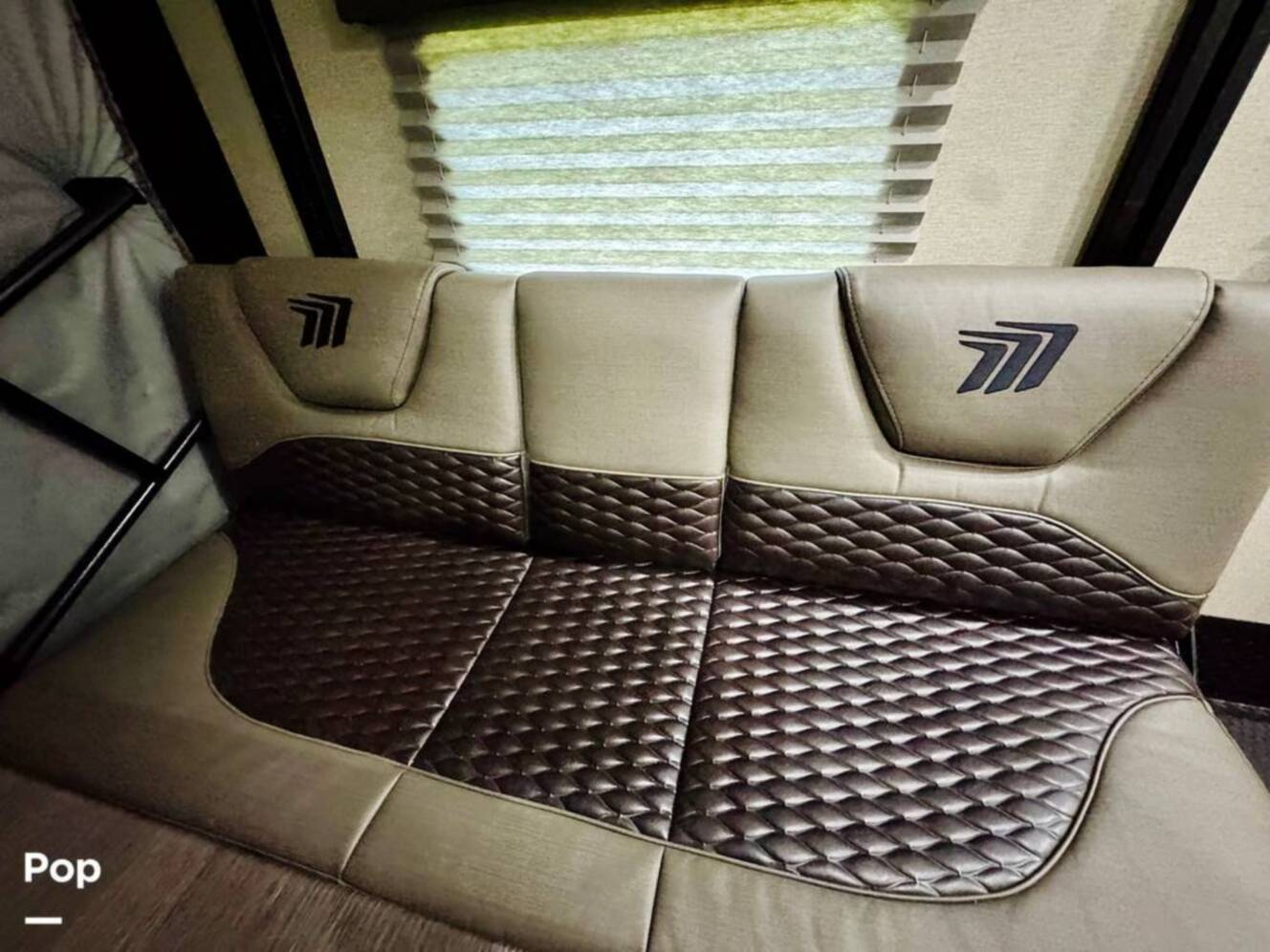 A photo of this 2022 Grand Design Momentum M-Class 351MS