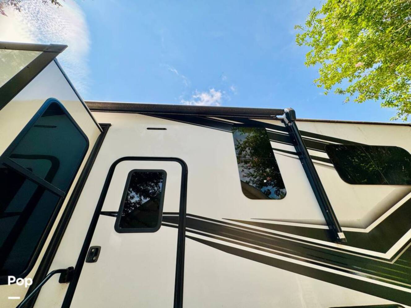 A photo of this 2022 Grand Design Momentum M-Class 351MS