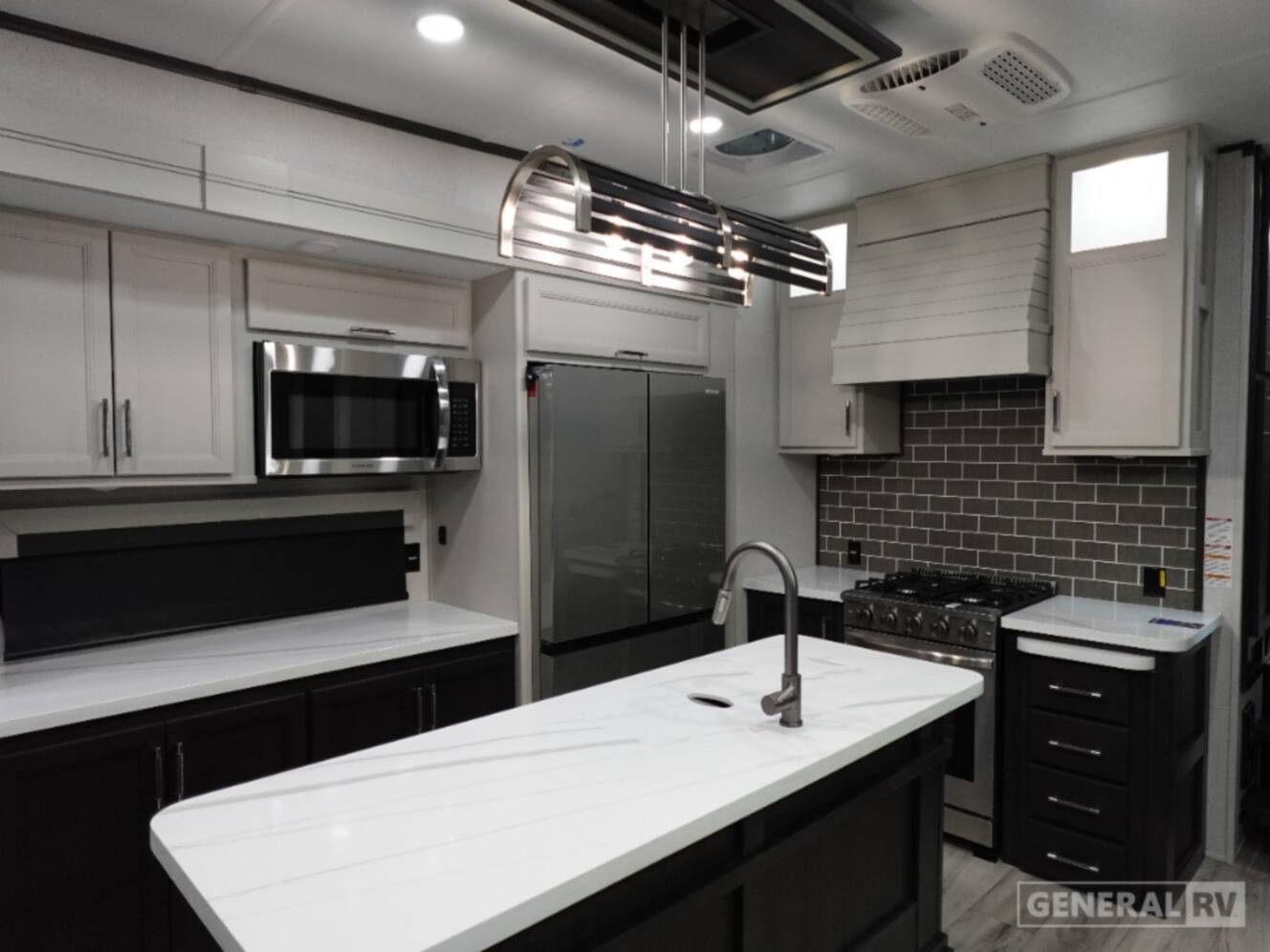 A photo of this 2026 Keystone Rv ALPINE 3303CK
