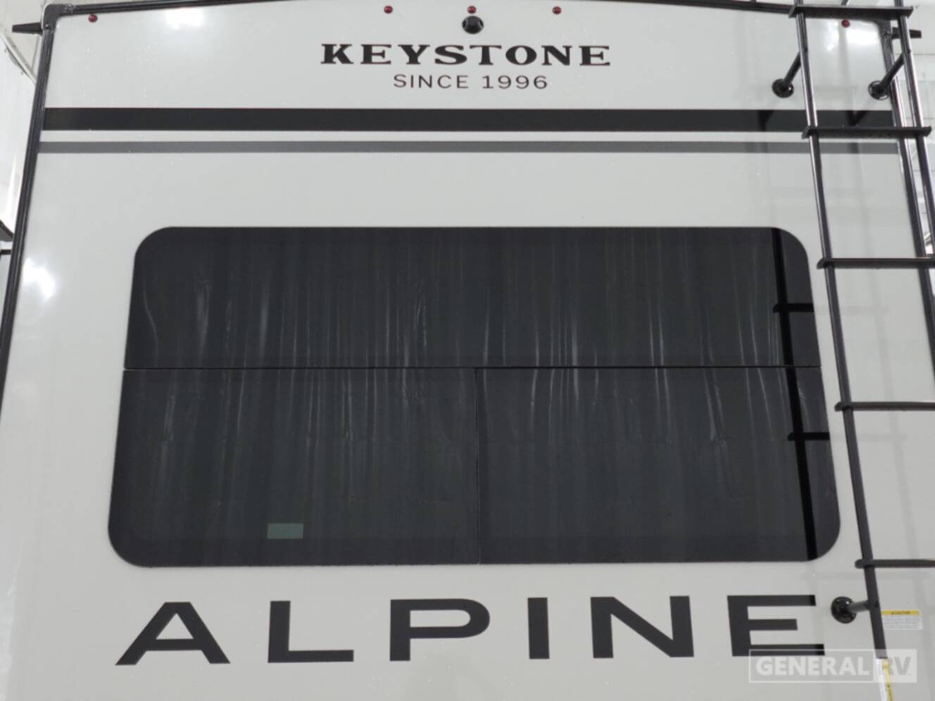 A photo of this 2026 Keystone Rv ALPINE 3303CK