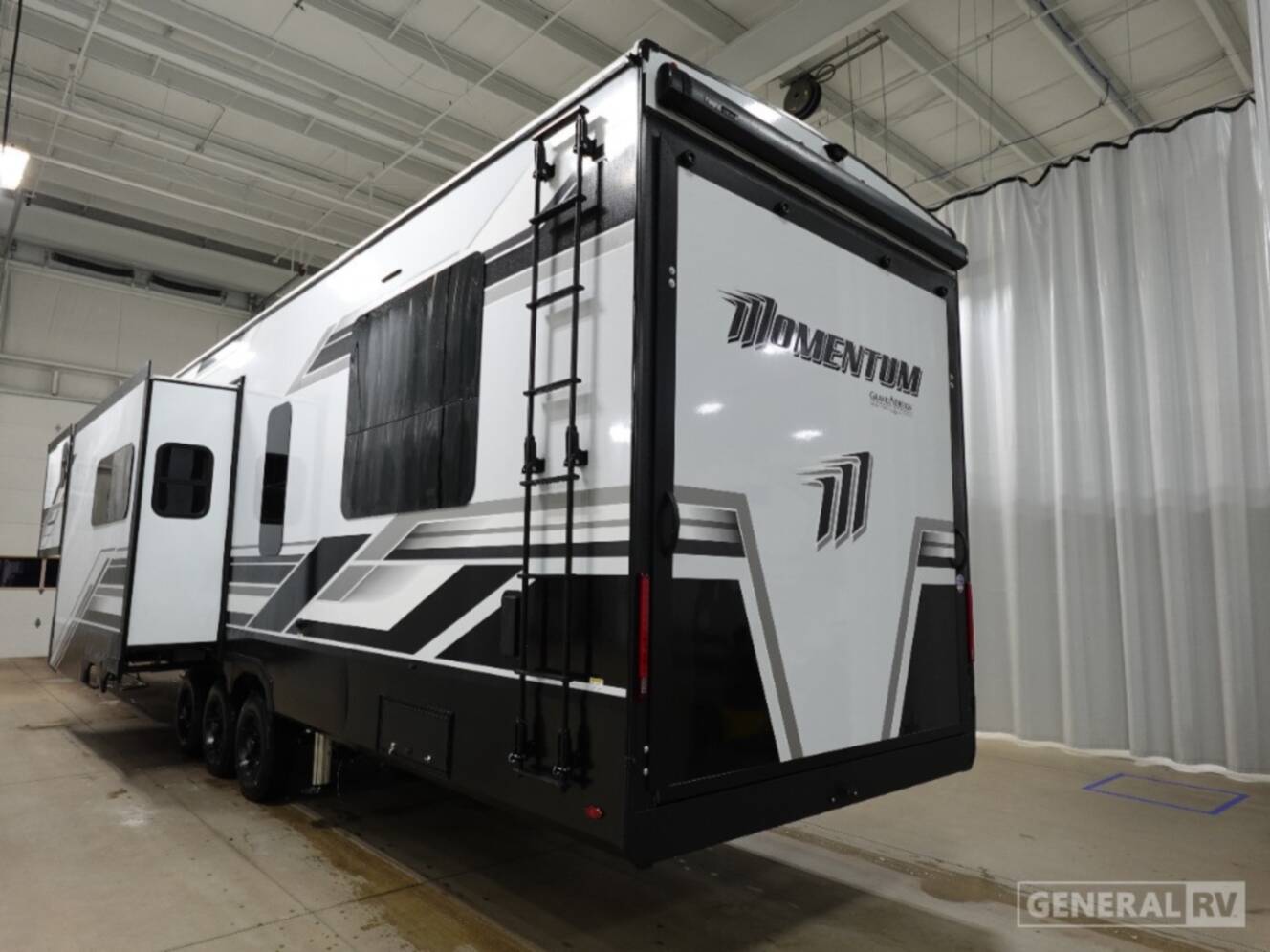 A photo of this 2026 Grand Design MOMENTUM 395MS