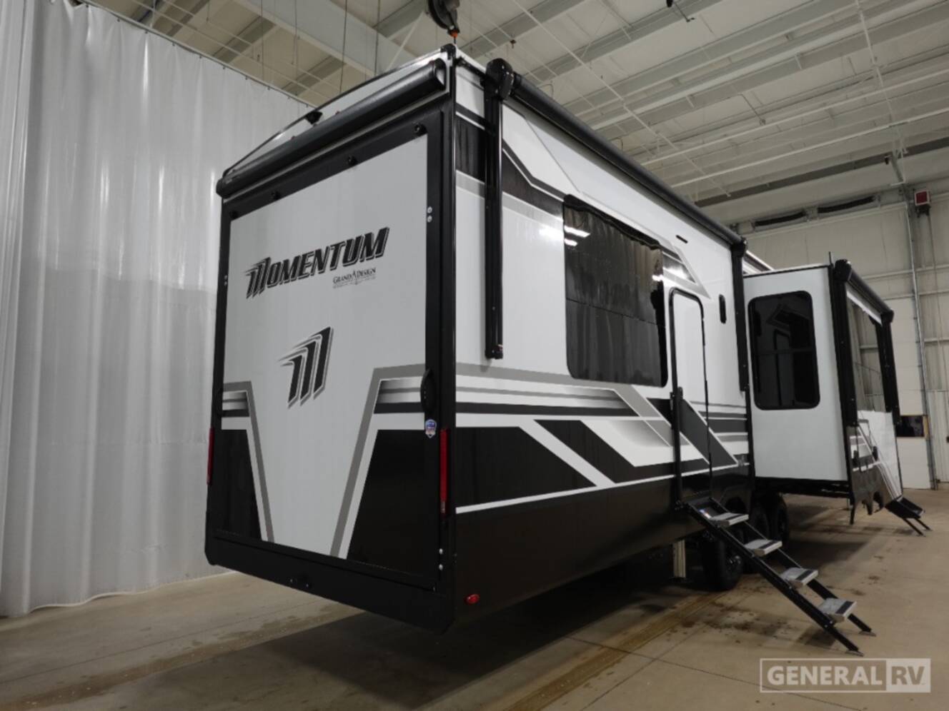 A photo of this 2026 Grand Design MOMENTUM 395MS