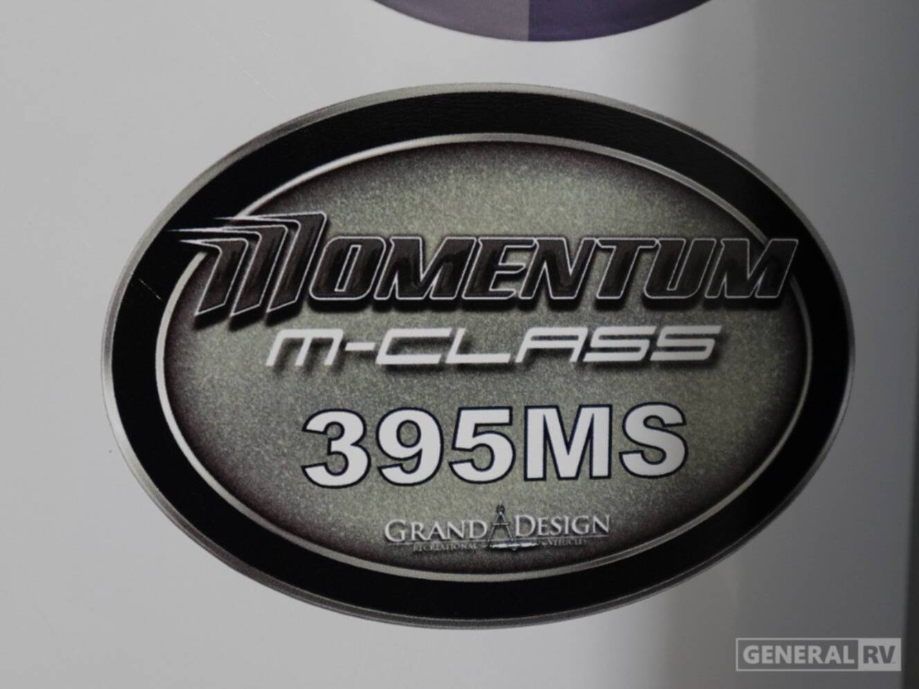 A photo of this 2026 Grand Design MOMENTUM 395MS