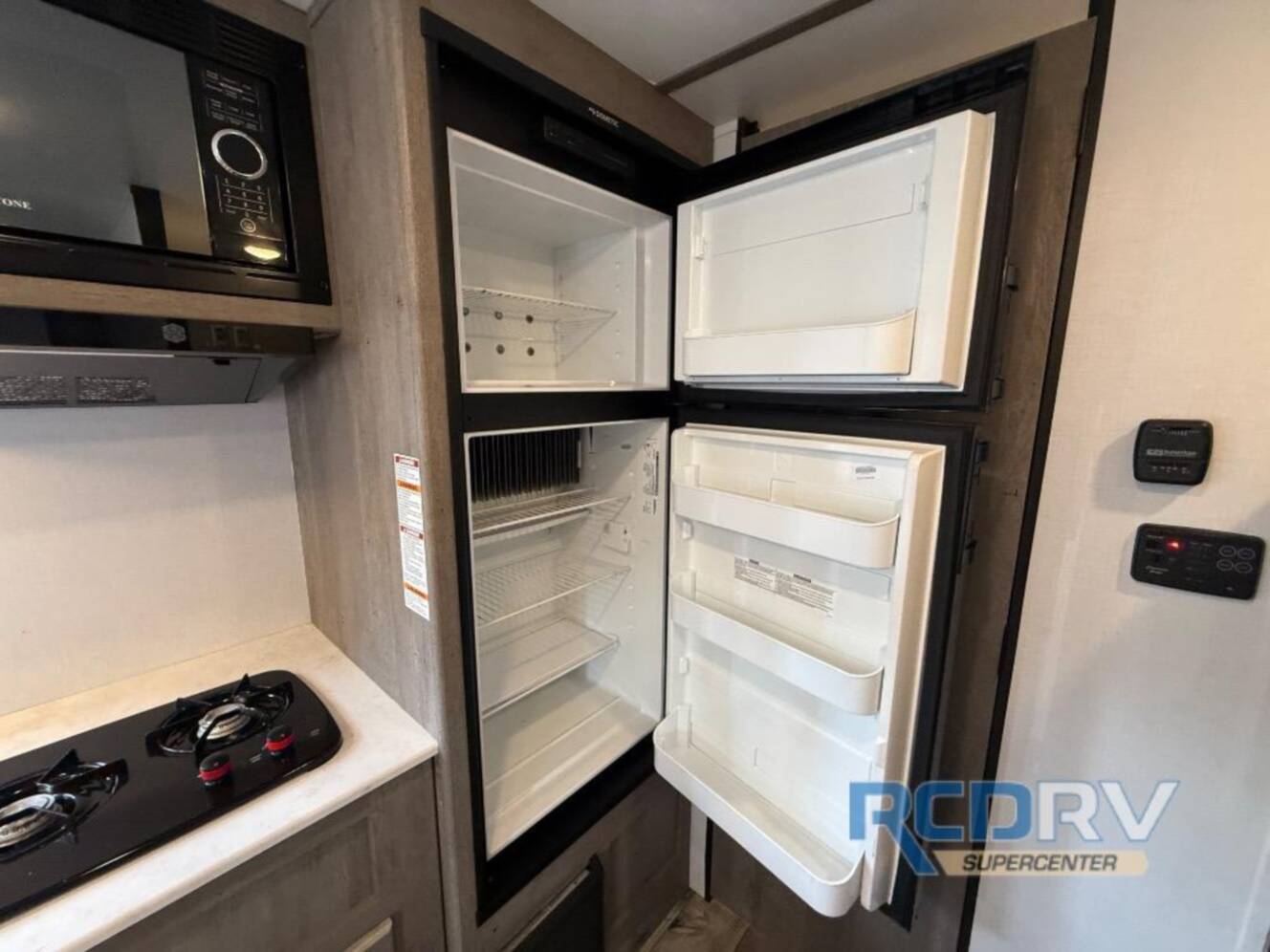 A photo of this 2021 Keystone Rv Springdale Mini 1760BH