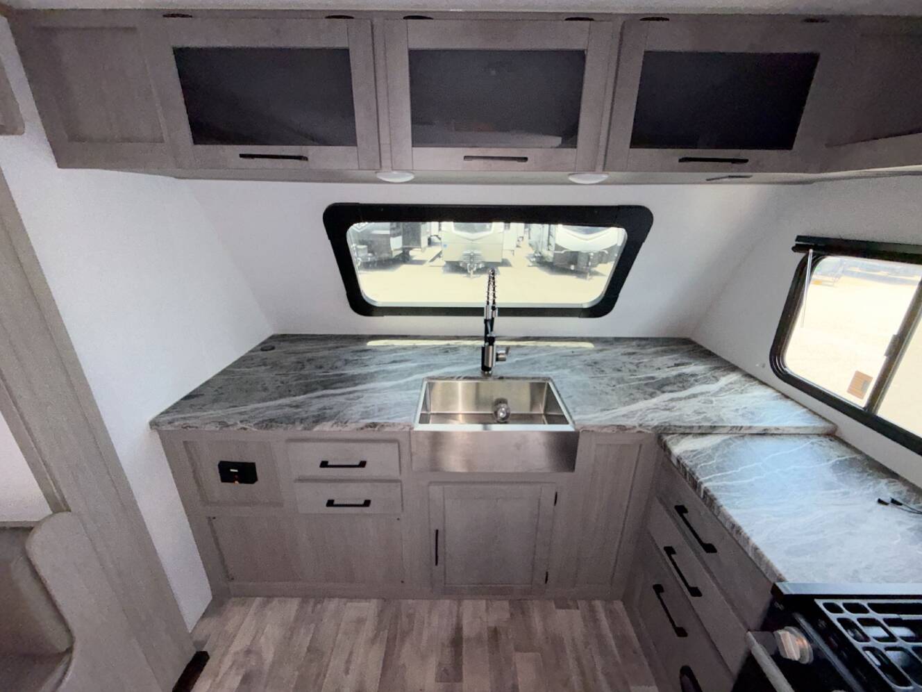 A photo of this 2024 Dutchmen KODIAK ULTIMATE 2921FKDS