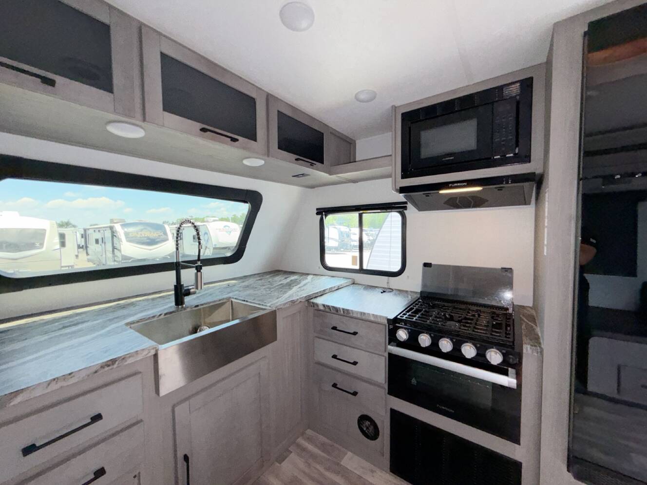 A photo of this 2024 Dutchmen KODIAK ULTIMATE 2921FKDS