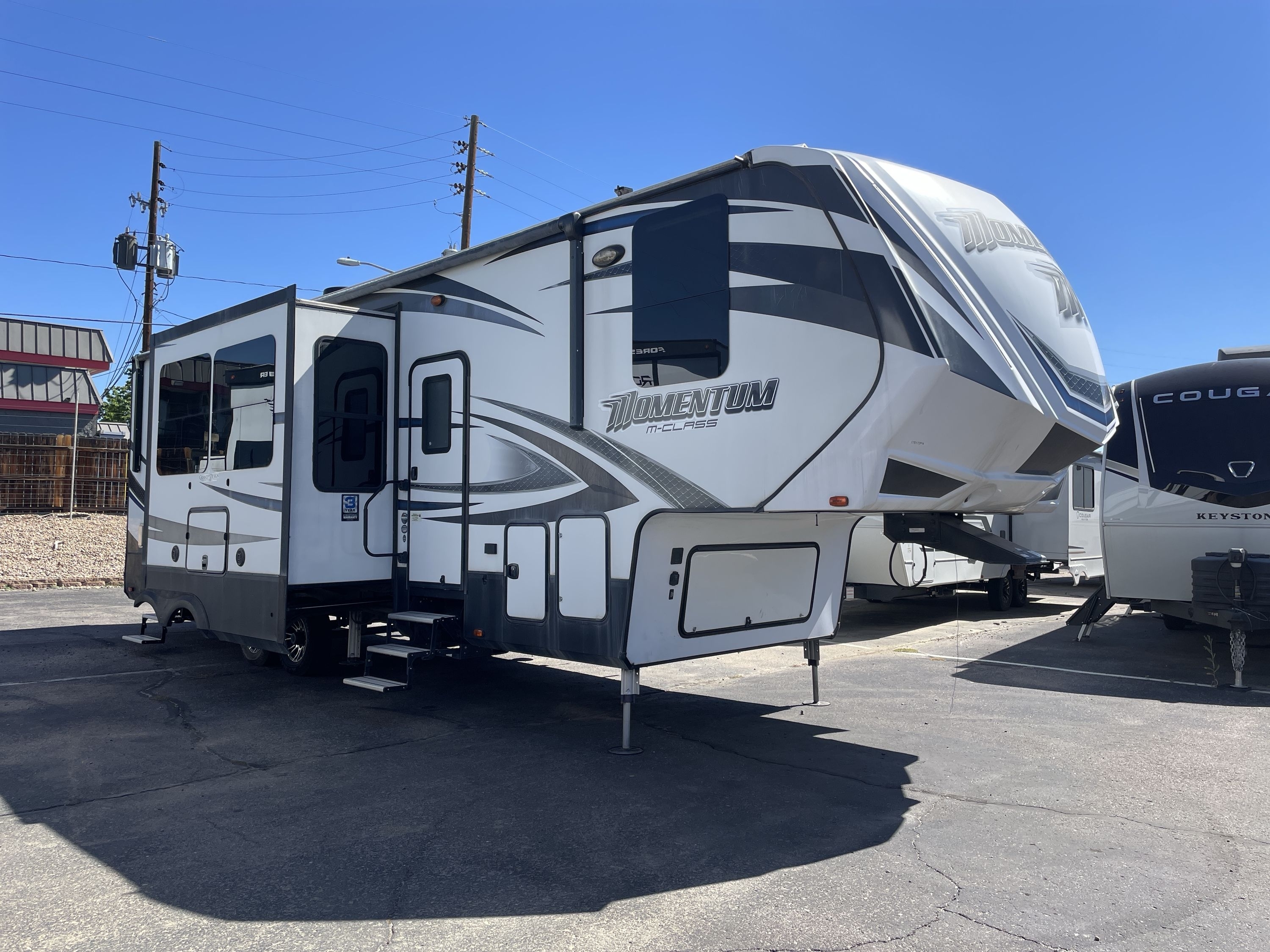 2017 Grand Design MOMENTUM 328M Fifth Wheel Toy Hauler RV